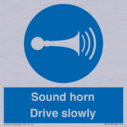 sound-horn-drive-slowly-warehousing-and-delivery-sign~